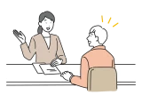 店頭で話す人