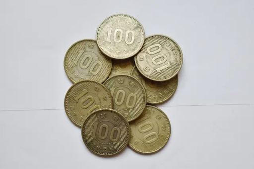 100円銀貨の重さは何グラム？